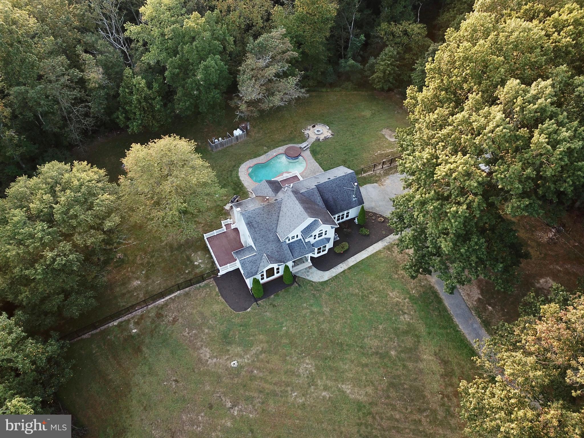 3444 Woodbine Road Woodbine, MD 21797 - Photo 70 of 78 an aerial view of a house with a yard lake house and outdoor seating
