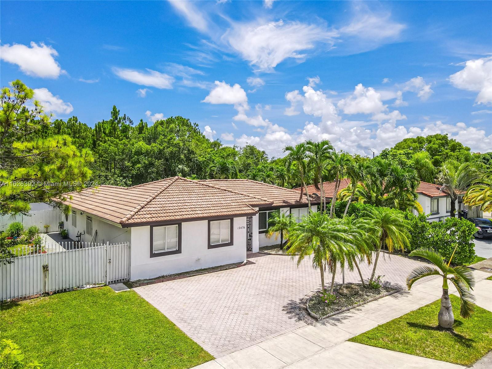 Goulds Miami, FL 33170 - Photo 2 of 36 a aerial view of a house with a yard and potted plants