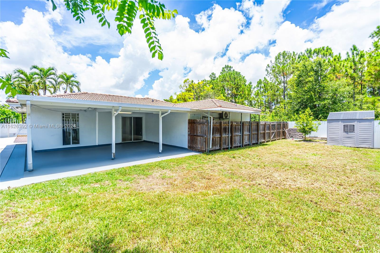 Goulds Miami, FL 33170 - Photo 28 of 36 a view of a house with a yard and sitting area