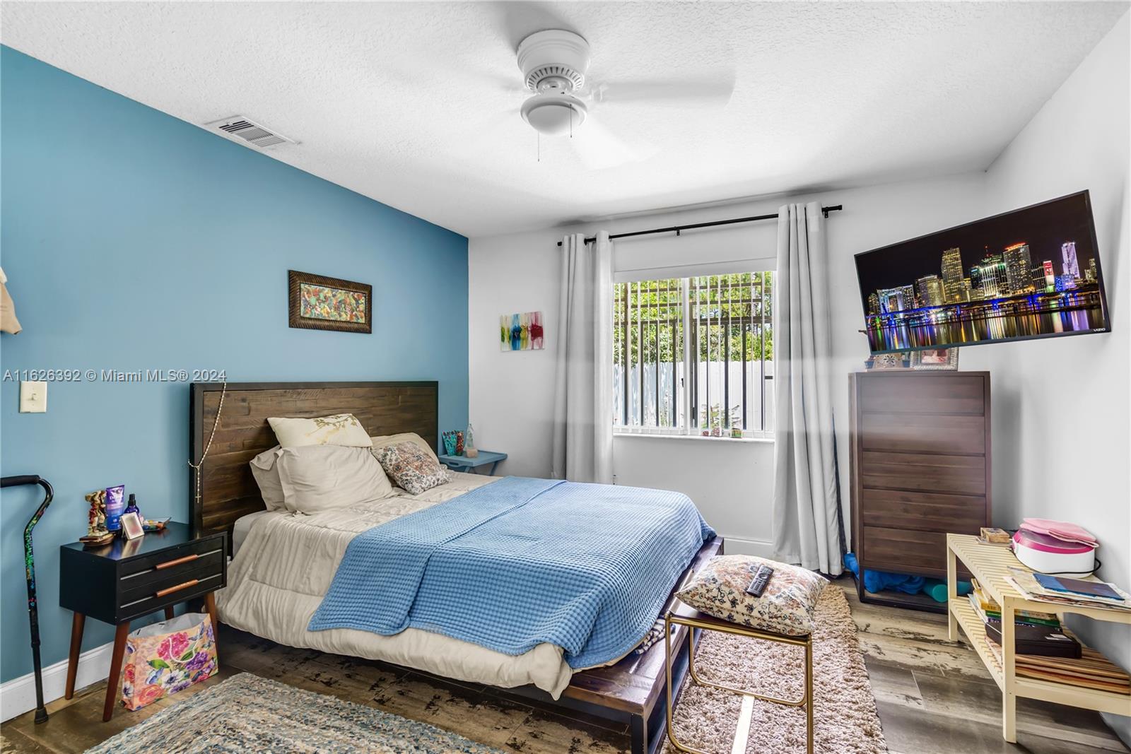 Goulds Miami, FL 33170 - Photo 34 of 36 a bedroom with a bed and wooden floor