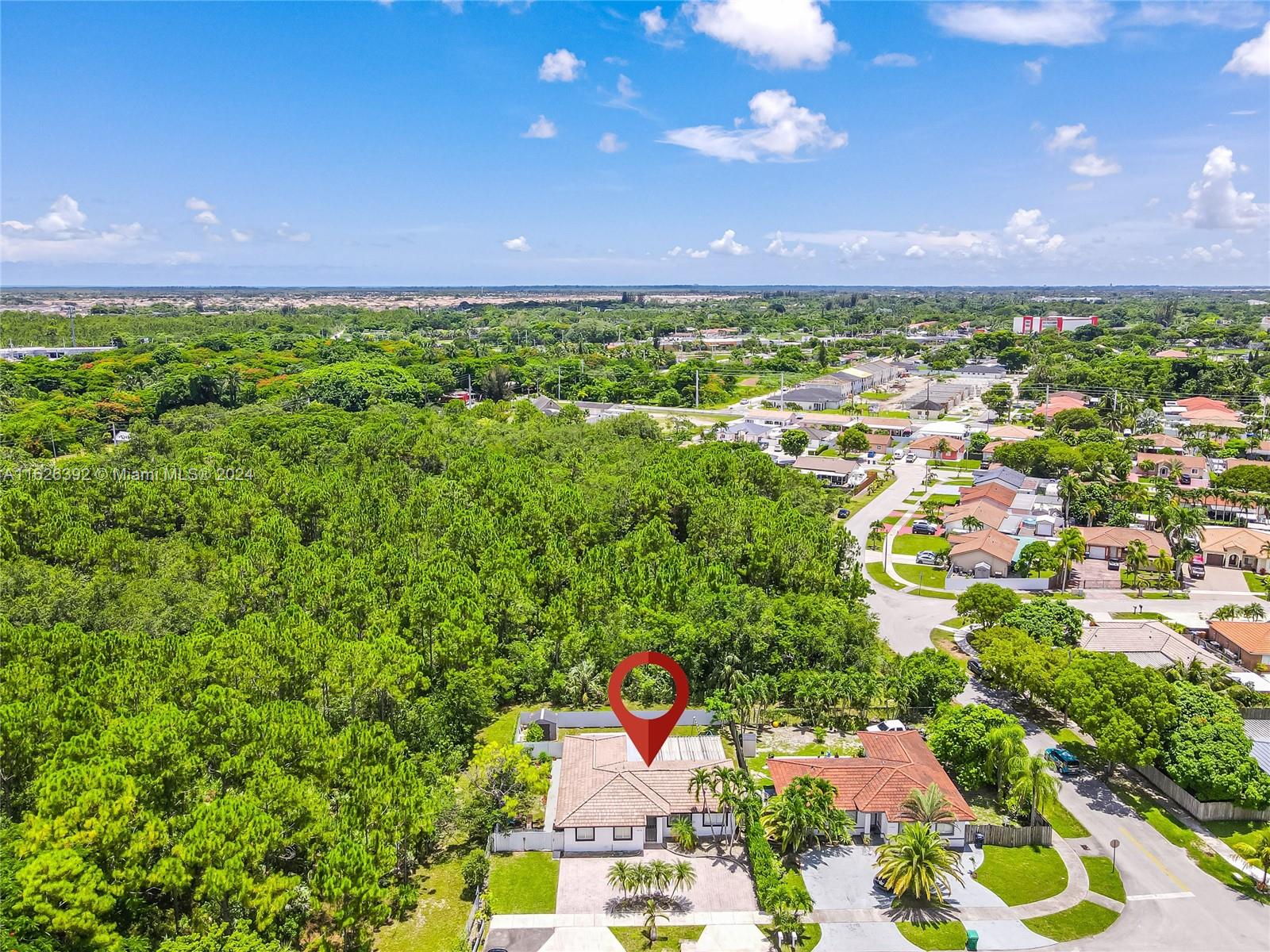 Goulds Miami, FL 33170 - Photo 7 of 36 an aerial view of a house with a yard and lake view