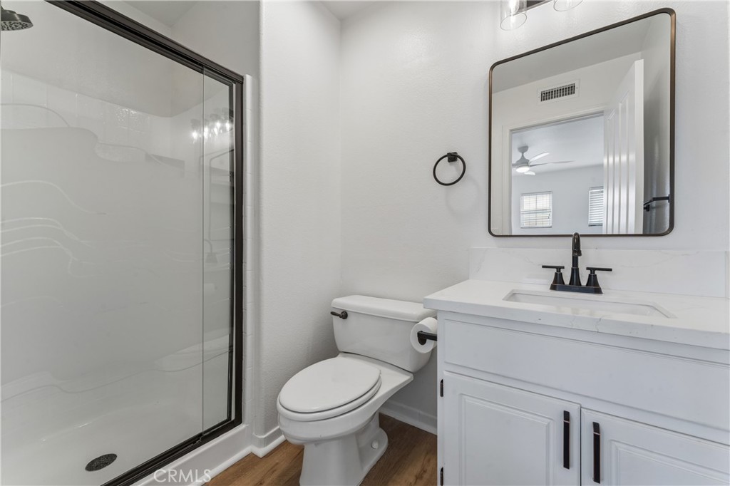 26023 Salinger Lane Stevenson Ranch, CA 91381 - Photo 22 of 35 Renovated upstairs bathroom featuring modern finishes and fixtures.