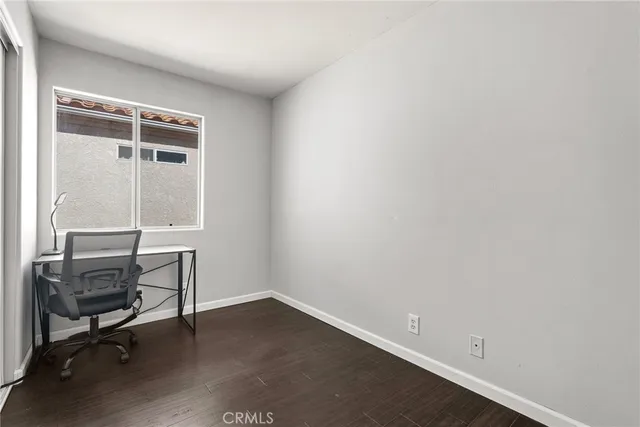 a view of a room with a window