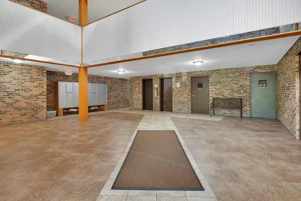 a view of a hallway with the glass door