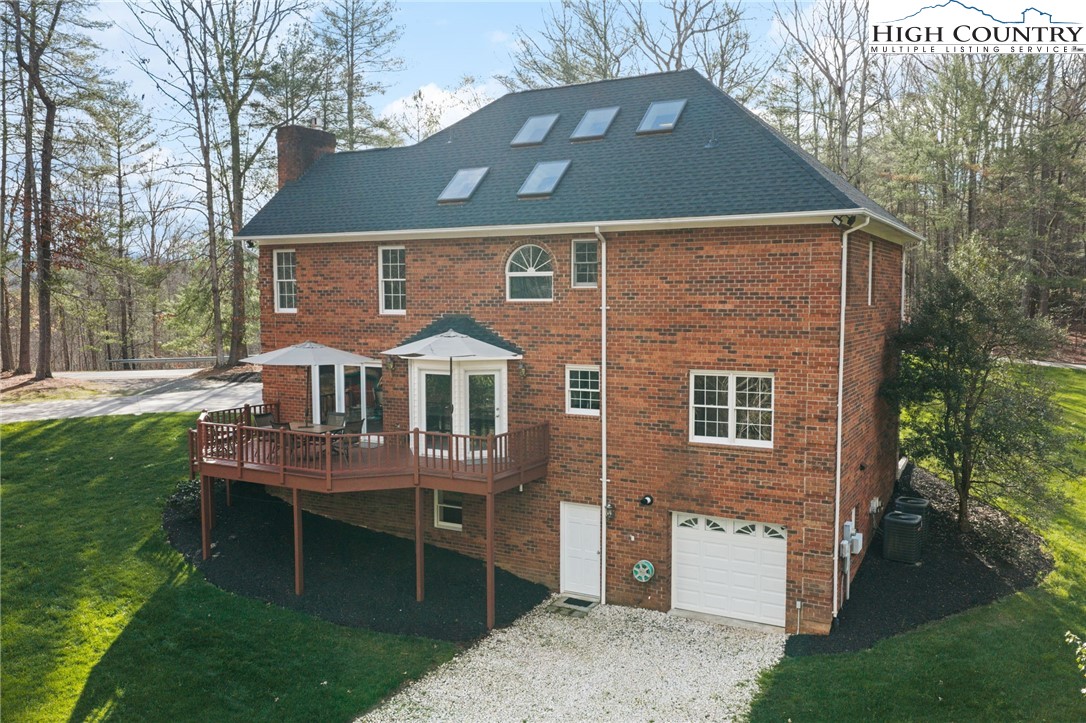 458 Jim Caudill Road Wilkesboro, NC 28697 - Photo 41 of 50 a front view of a house with a yard