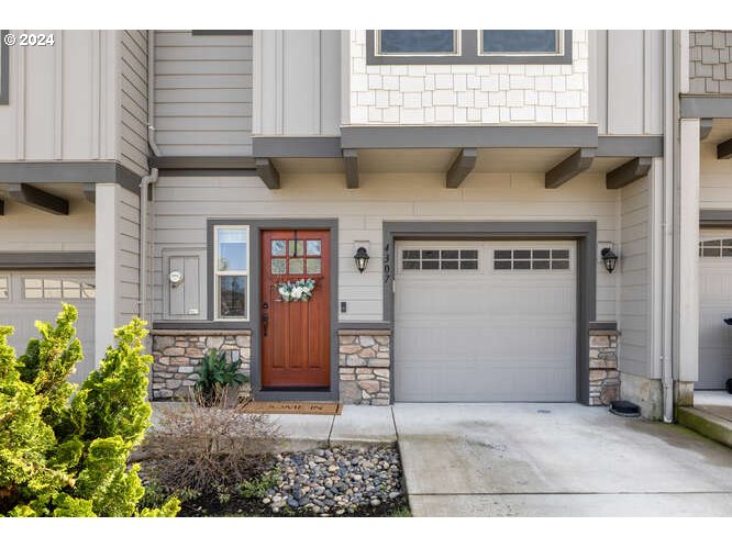 4307 Northwest Sage Loop Camas, WA 98607 - Photo 3 of 40 a front view of a building with entryway