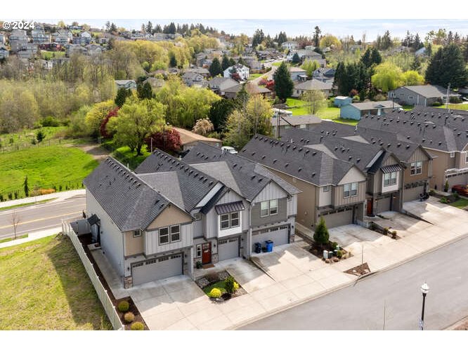 4307 Northwest Sage Loop Camas, WA 98607 - Photo 36 of 40 a view of a house with a big yard