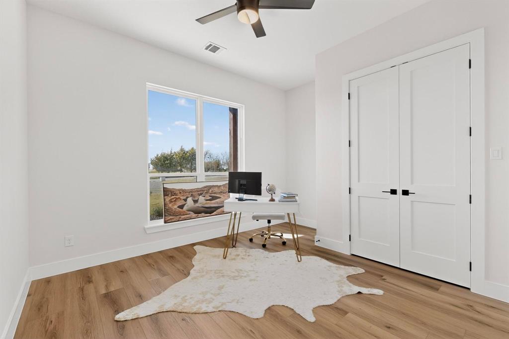 4961 County Road 1098 Celeste, TX 75423 - Photo 29 of 40 Office area featuring light wood-style flooring and ceiling fan