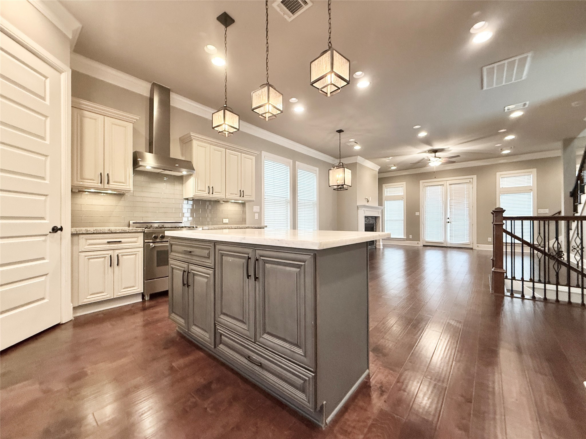 2116 Couch Street Houston, TX 77008 - Photo 11 of 43 a open kitchen with lots of counter space wooden floor and appliances