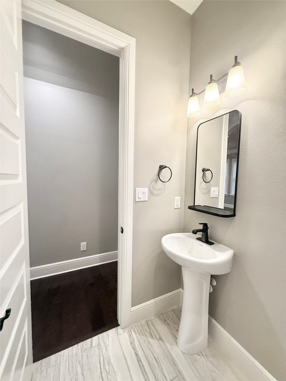2116 Couch Street Houston, TX 77008 - Photo 15 of 43 a bathroom with a sink and a mirror