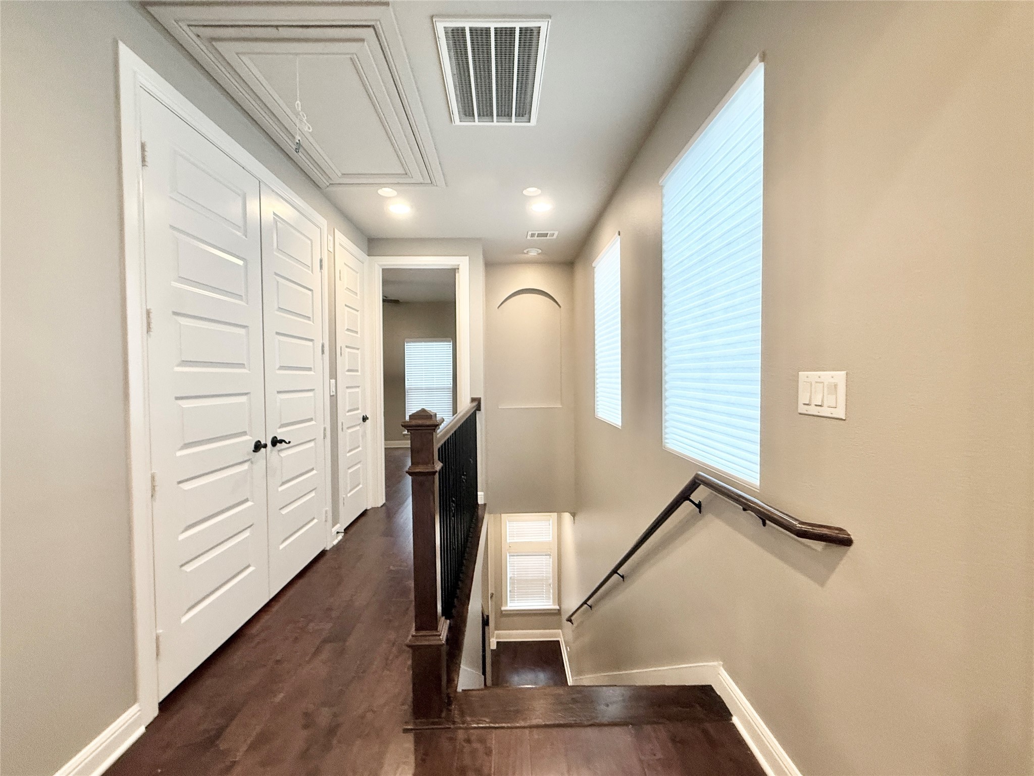 2116 Couch Street Houston, TX 77008 - Photo 18 of 43 a view of a hallway with staircase