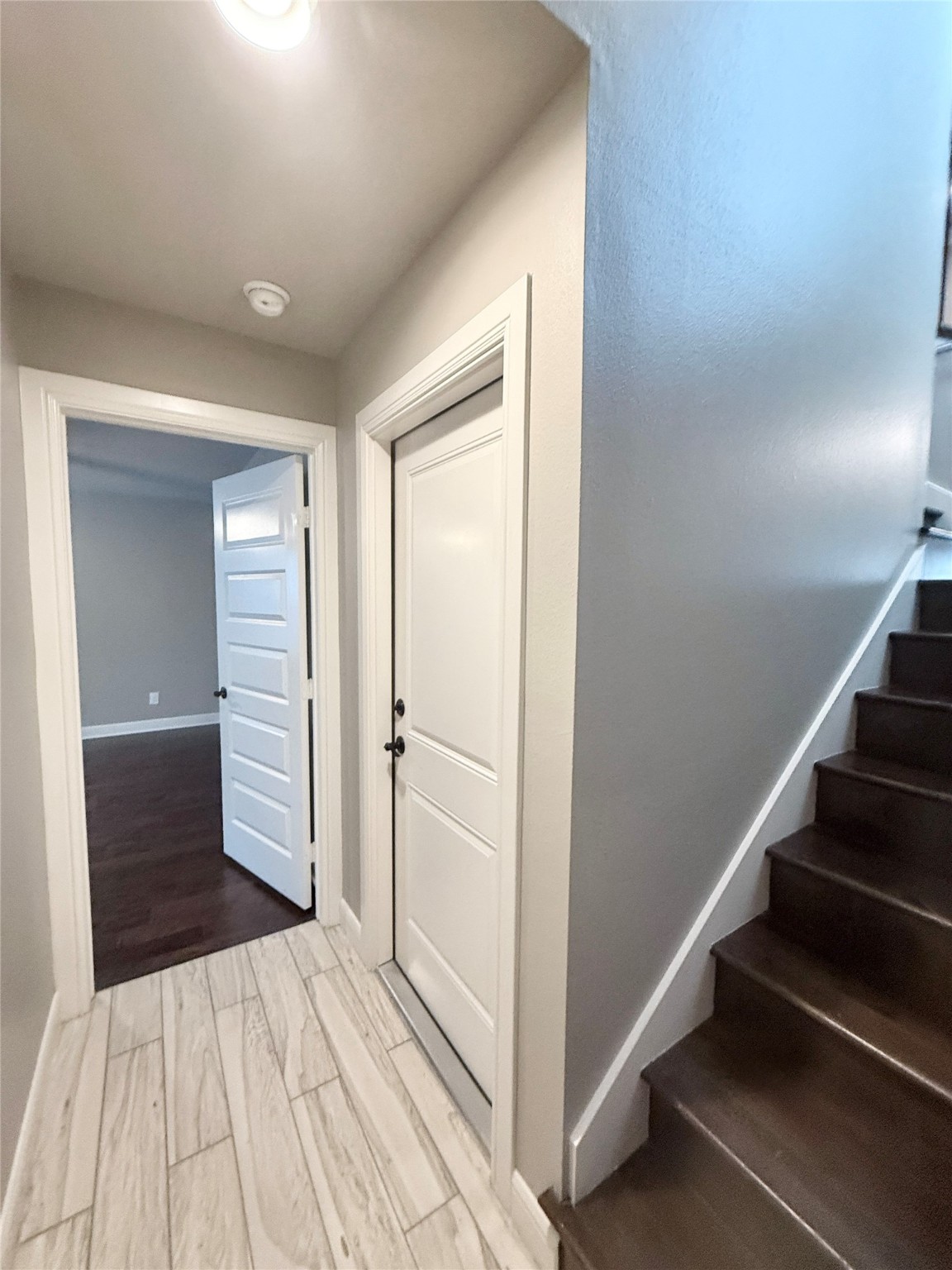 2116 Couch Street Houston, TX 77008 - Photo 37 of 43 a view of a hallway with wooden floor and entryway