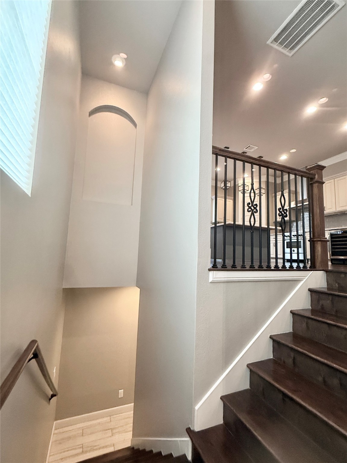 2116 Couch Street Houston, TX 77008 - Photo 6 of 43 a view of entryway with wooden floor