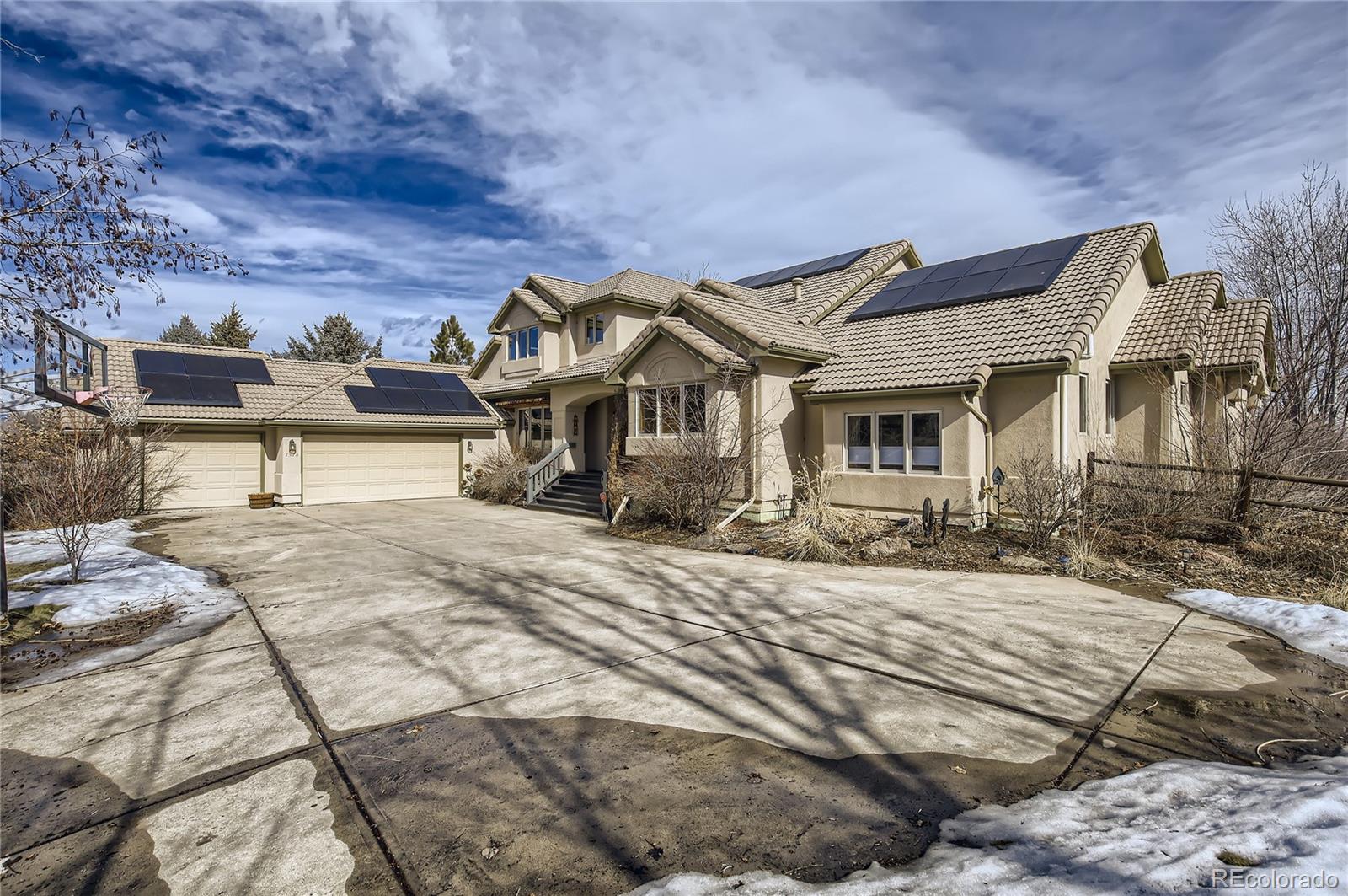 7578 Crestview Drive Niwot, CO 80504 - Photo 11 of 40 a front view of a house with a yard