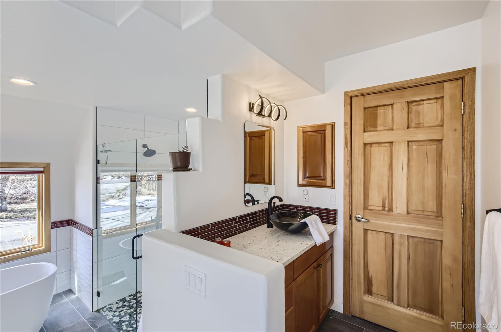 7578 Crestview Drive Niwot, CO 80504 - Photo 18 of 40 a kitchen that has a sink and a stove in it