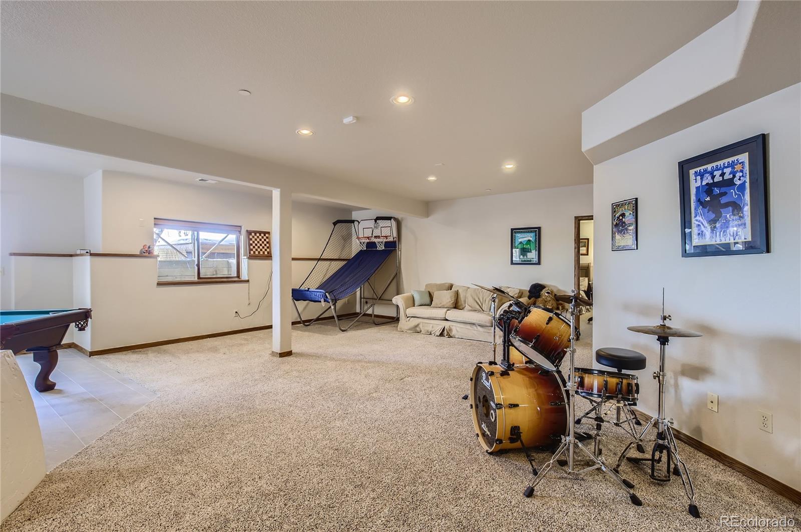 7578 Crestview Drive Niwot, CO 80504 - Photo 27 of 40 a room with furniture and air hockey table