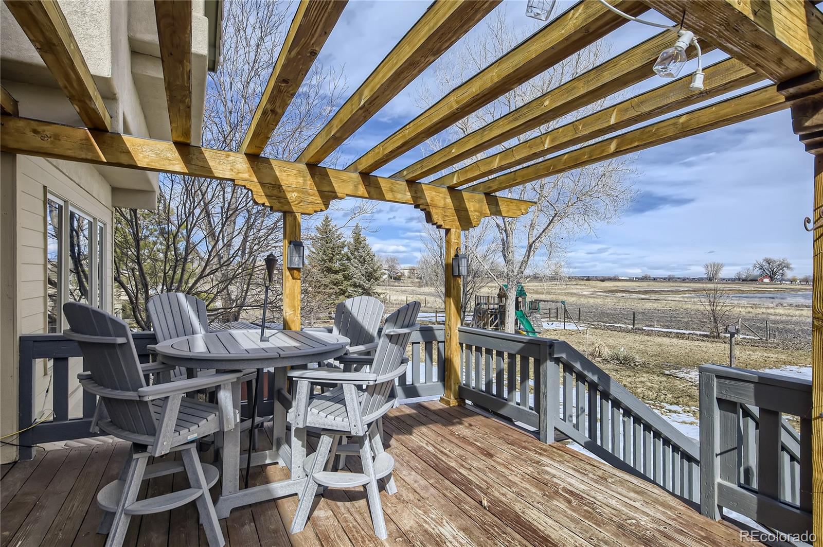 7578 Crestview Drive Niwot, CO 80504 - Photo 32 of 40 a view of a balcony with furniture