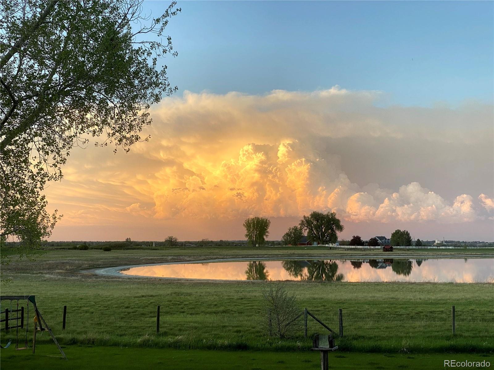 7578 Crestview Drive Niwot, CO 80504 - Photo 34 of 40 a view of a lake from a yard