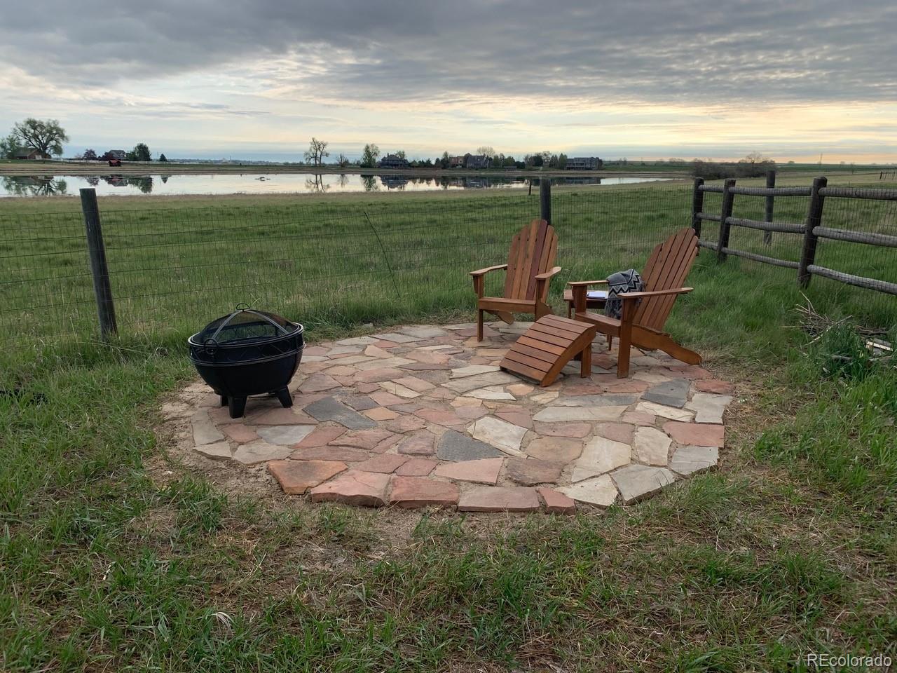 7578 Crestview Drive Niwot, CO 80504 - Photo 35 of 40 a view of a garden with sitting area