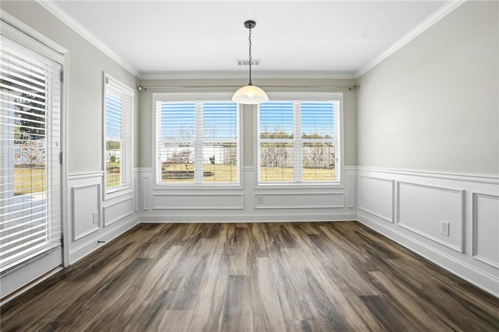 649 Tanners Bridge Road Bethlehem, GA 30620 - Photo 12 of 30 a view of empty room with wooden floor and fan