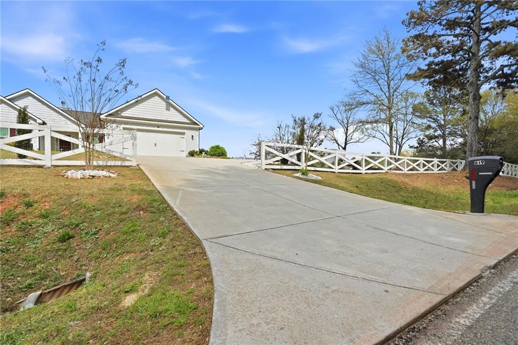649 Tanners Bridge Road Bethlehem, GA 30620 - Photo 2 of 30 a view of front of house with a street