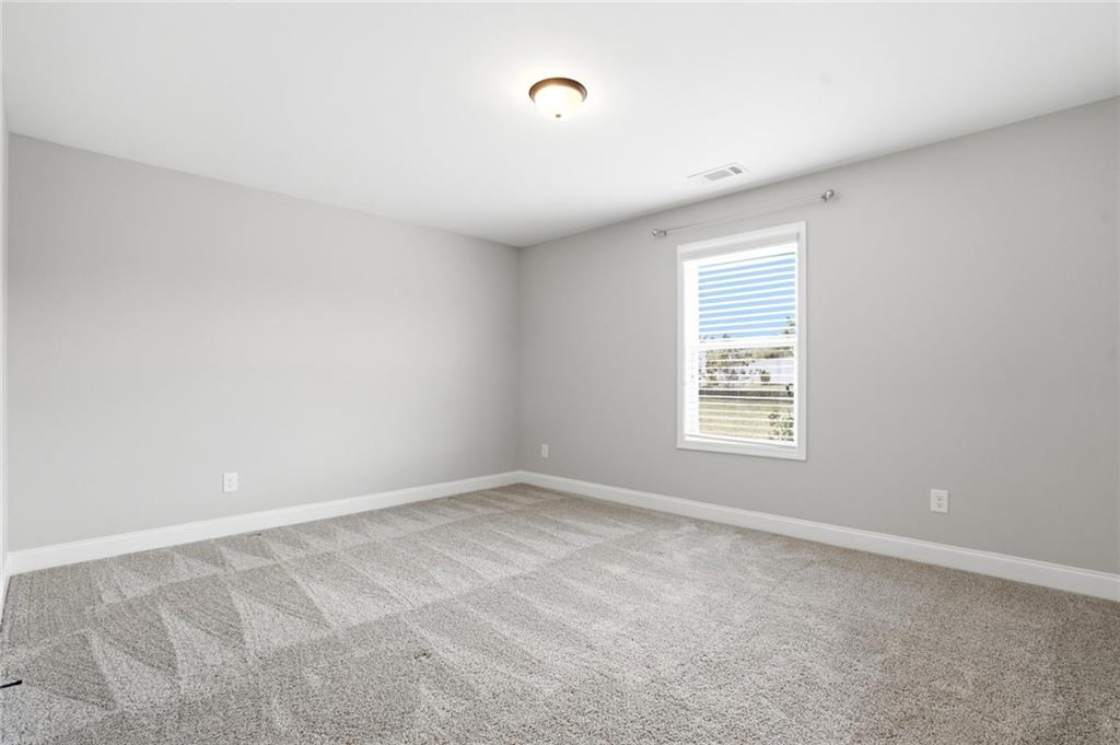 649 Tanners Bridge Road Bethlehem, GA 30620 - Photo 21 of 30 an empty room with a window