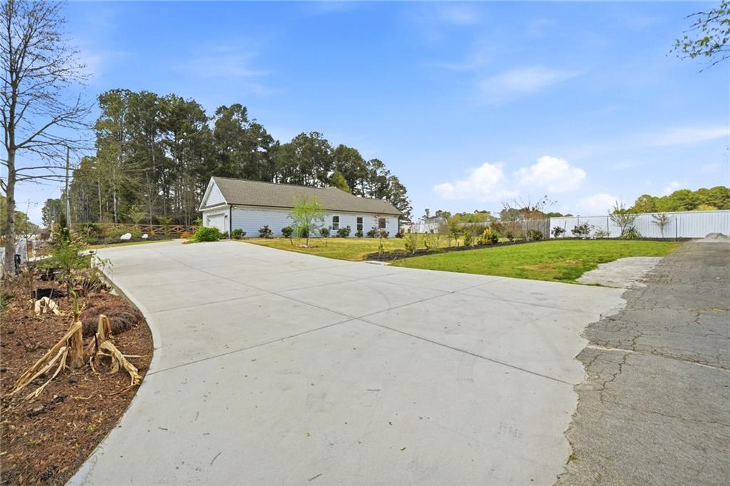 649 Tanners Bridge Road Bethlehem, GA 30620 - Photo 28 of 30 a view of a big yard with potted plants and big trees