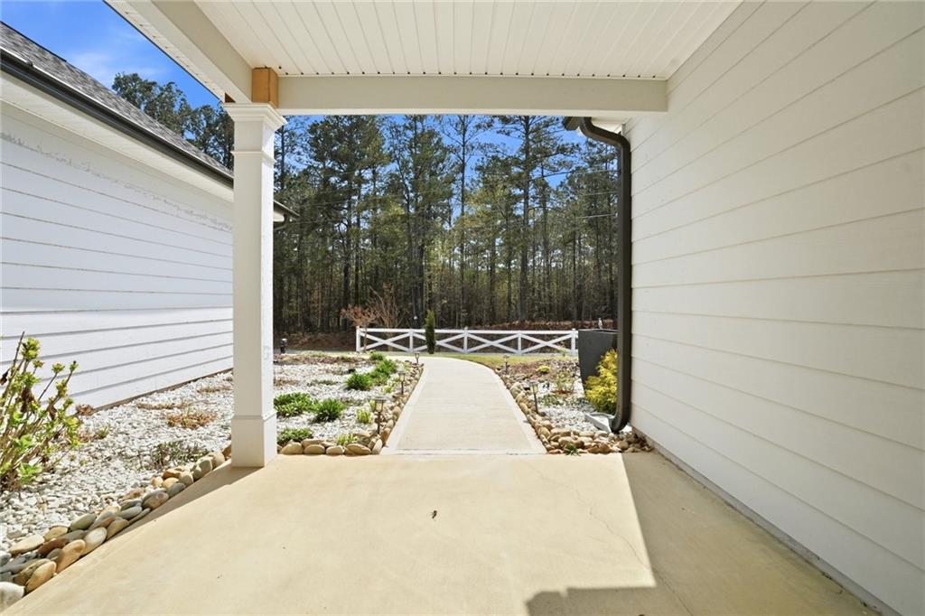 649 Tanners Bridge Road Bethlehem, GA 30620 - Photo 4 of 30 a view of a large window with a yard