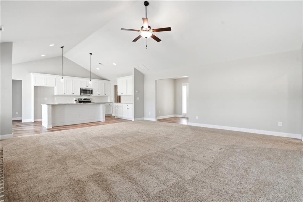 649 Tanners Bridge Road Bethlehem, GA 30620 - Photo 6 of 30 a view of a kitchen with a sink and a stove top oven