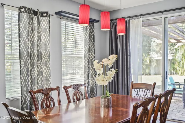 a kitchen with stainless steel appliances granite countertop a stove top oven a sink and dishwasher