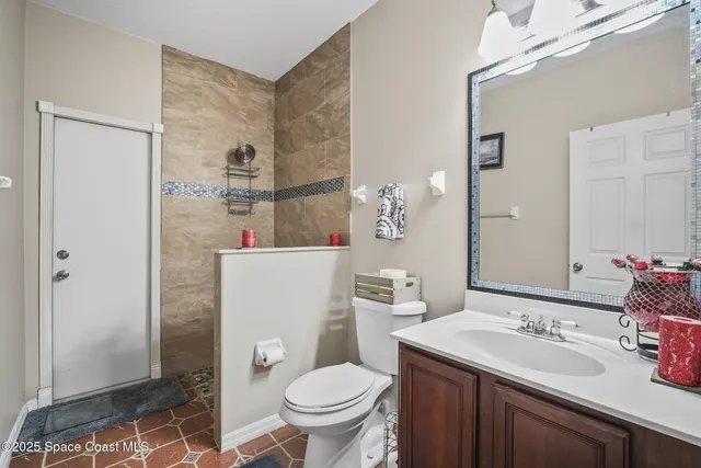 a bathroom with a tub and a sink