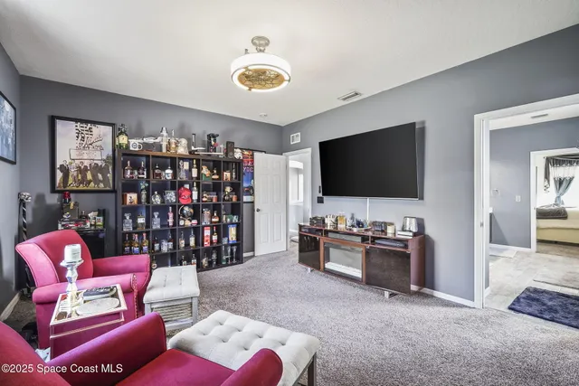 a view of a swimming pool with a yard