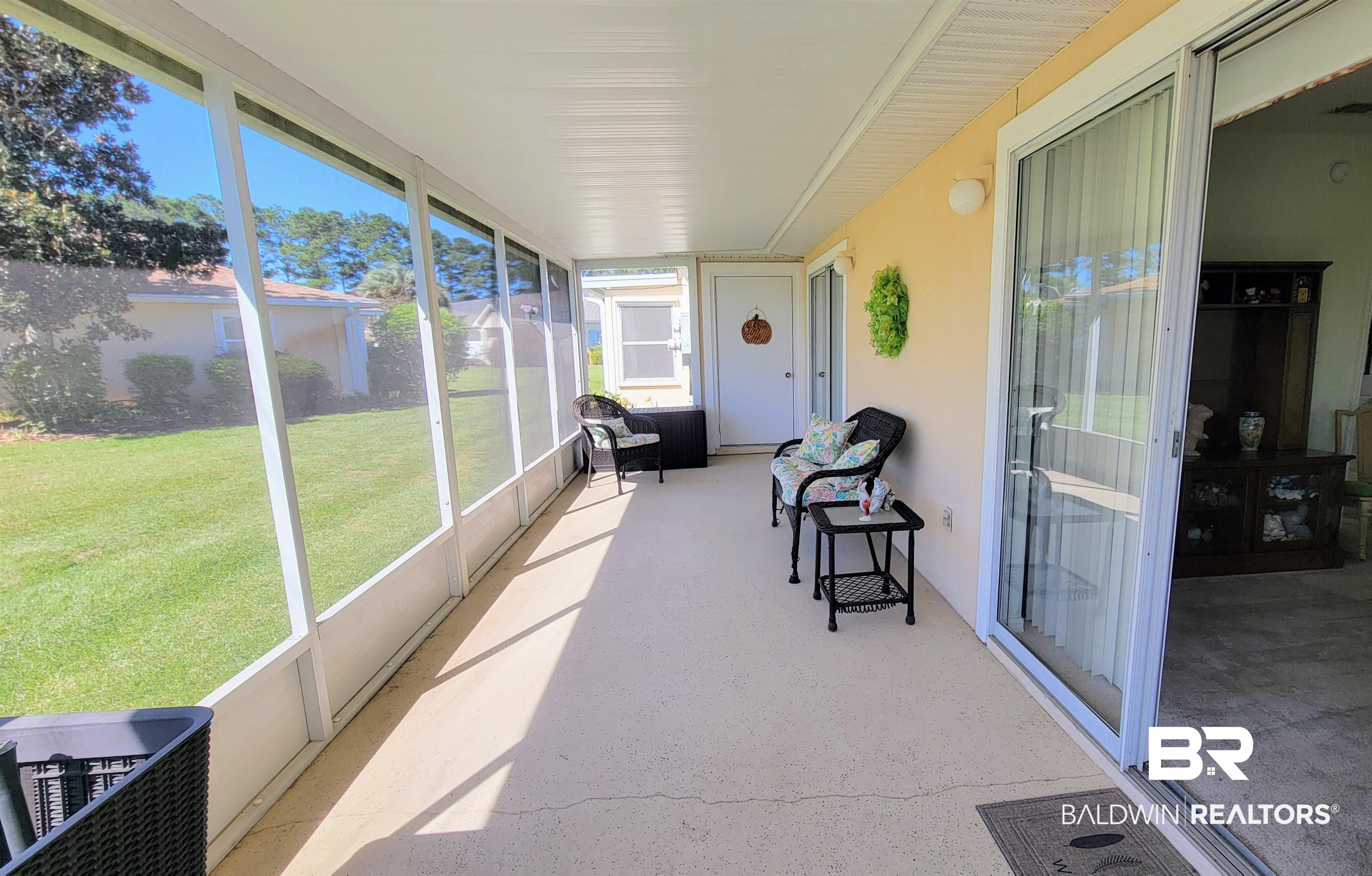 9445 Villas Drive Foley, AL 36535 - Photo 15 of 20 View of screened porch