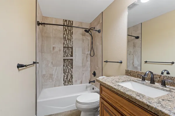 a view of backyard with tree