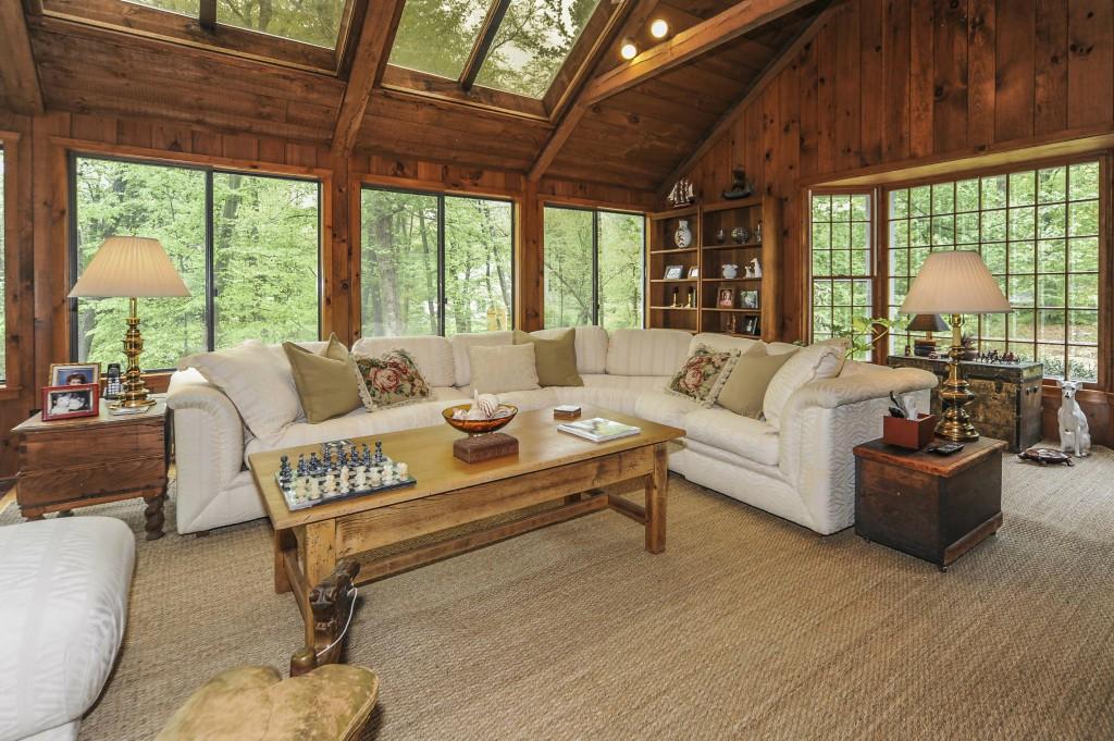719 Cheese Spring Road New Canaan, CT 06840 - Photo 14 of 24 a living room with furniture and a large window