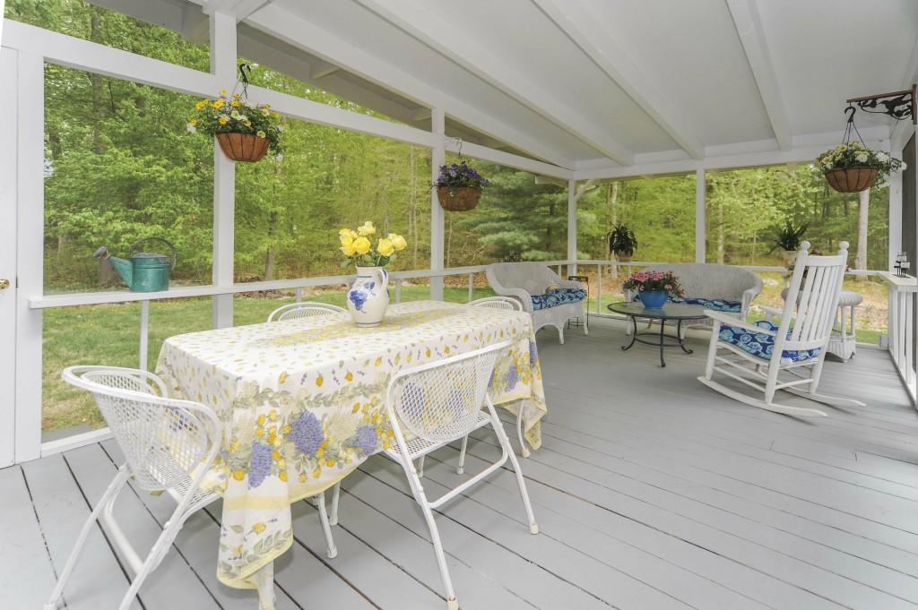 719 Cheese Spring Road New Canaan, CT 06840 - Photo 19 of 24 a view of an outdoor dining space with furniture window and outside view