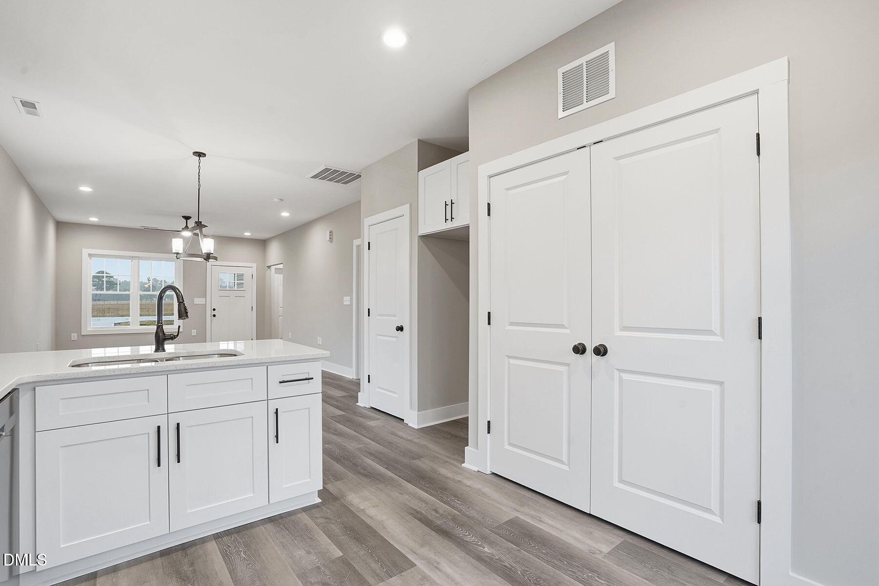 1029 Jada Allen Road Dunn, NC 28334 - Photo 13 of 31 a large bathroom with a sink a mirror and a vanity
