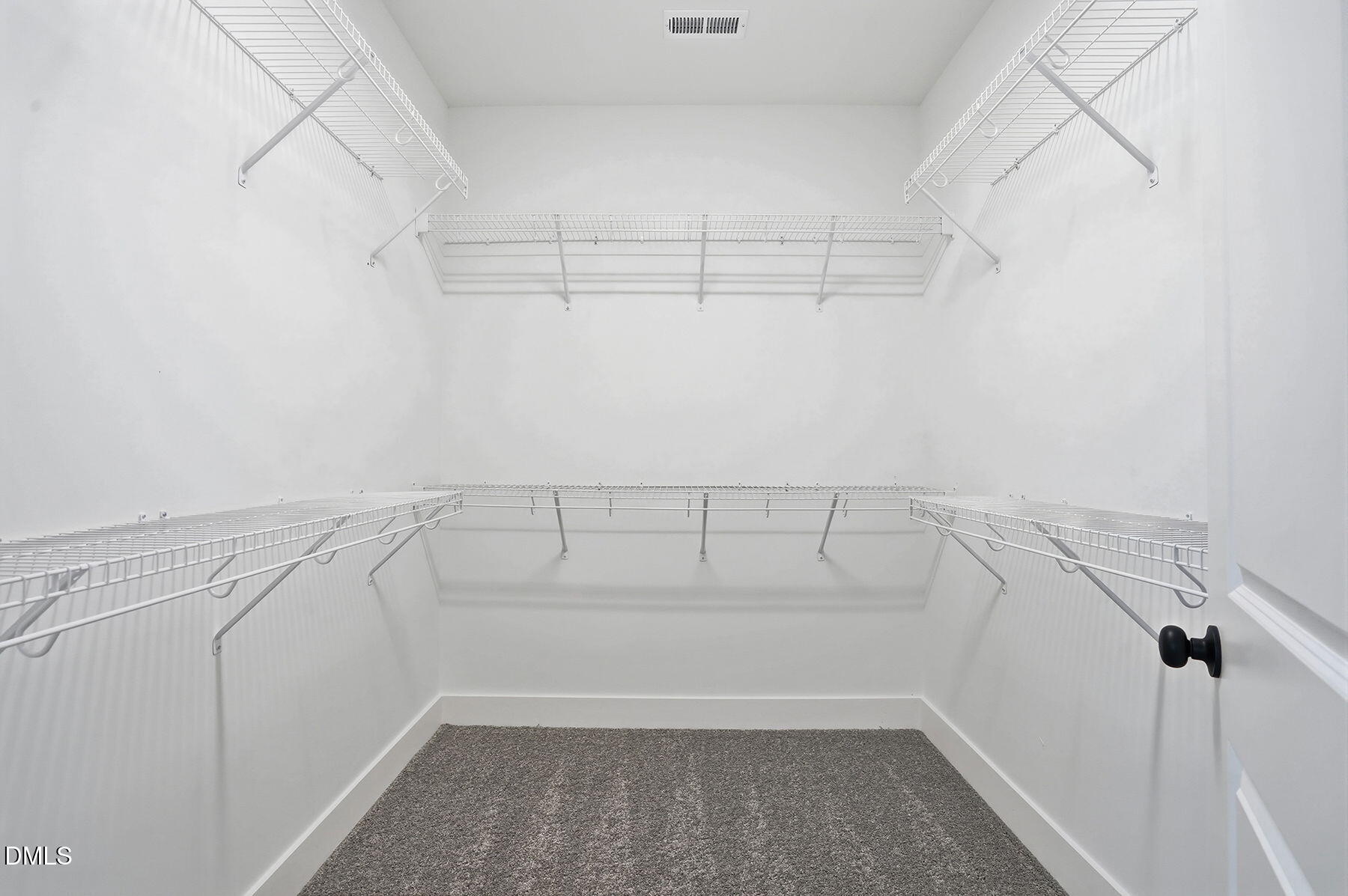 1029 Jada Allen Road Dunn, NC 28334 - Photo 18 of 31 a view of a room with racks on the wall