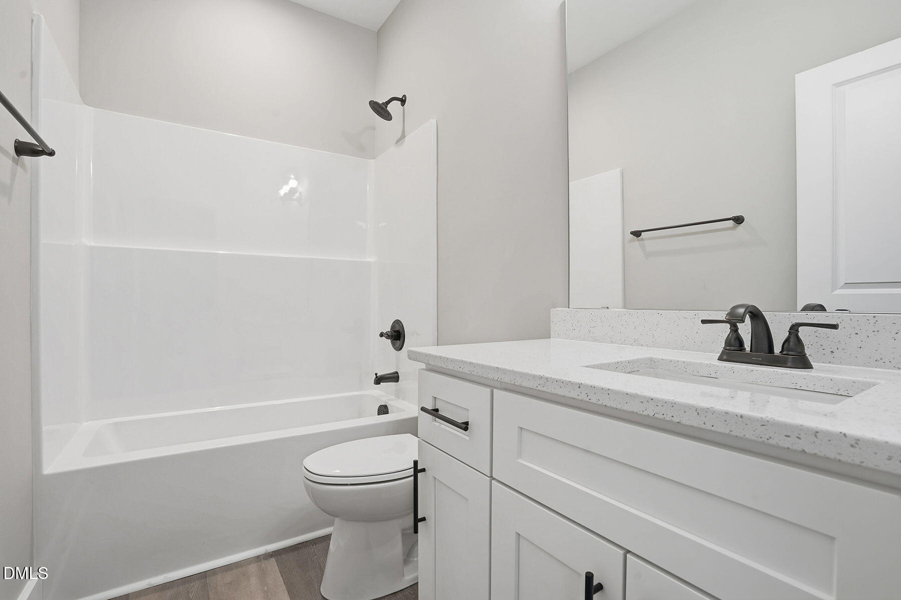 1029 Jada Allen Road Dunn, NC 28334 - Photo 19 of 31 a bathroom with a sink a toilet and shower