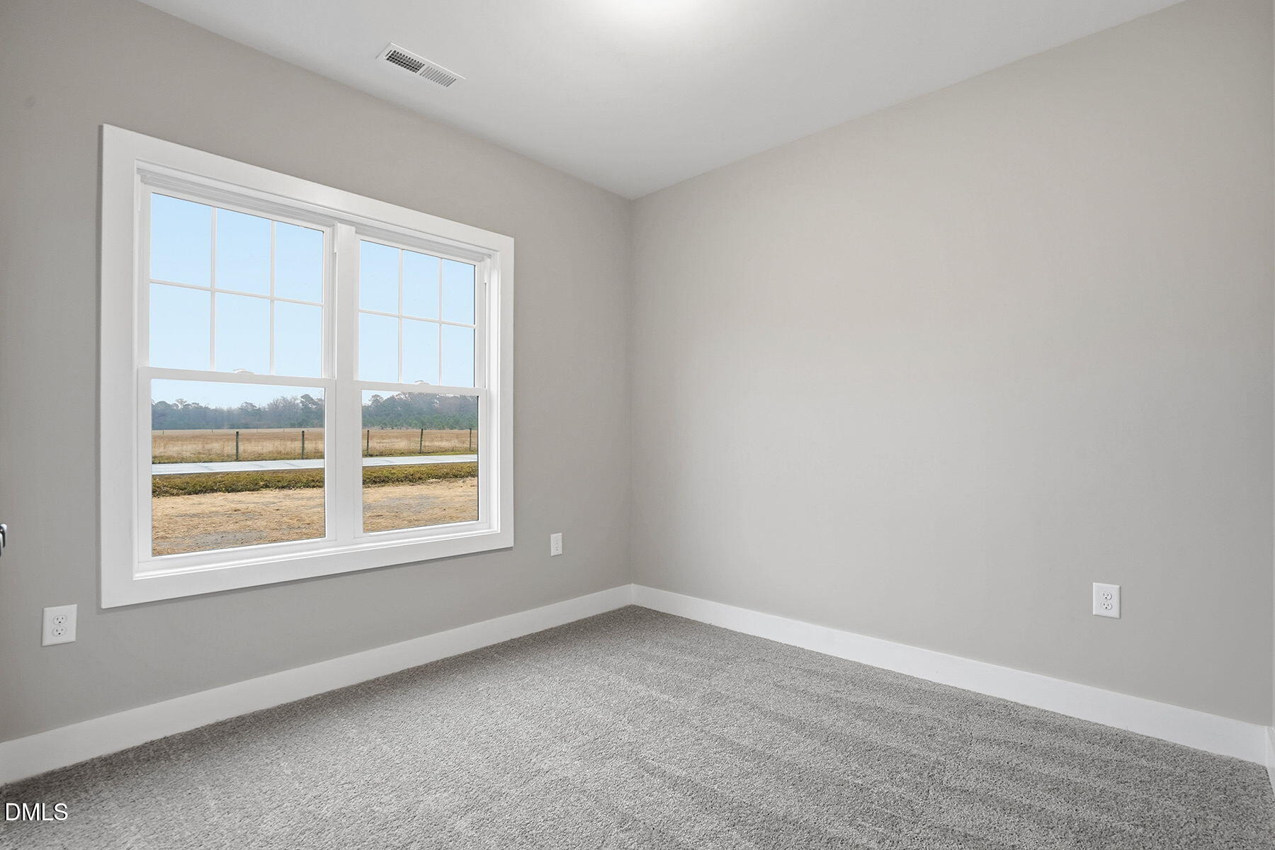 1029 Jada Allen Road Dunn, NC 28334 - Photo 23 of 31 an empty room with a window