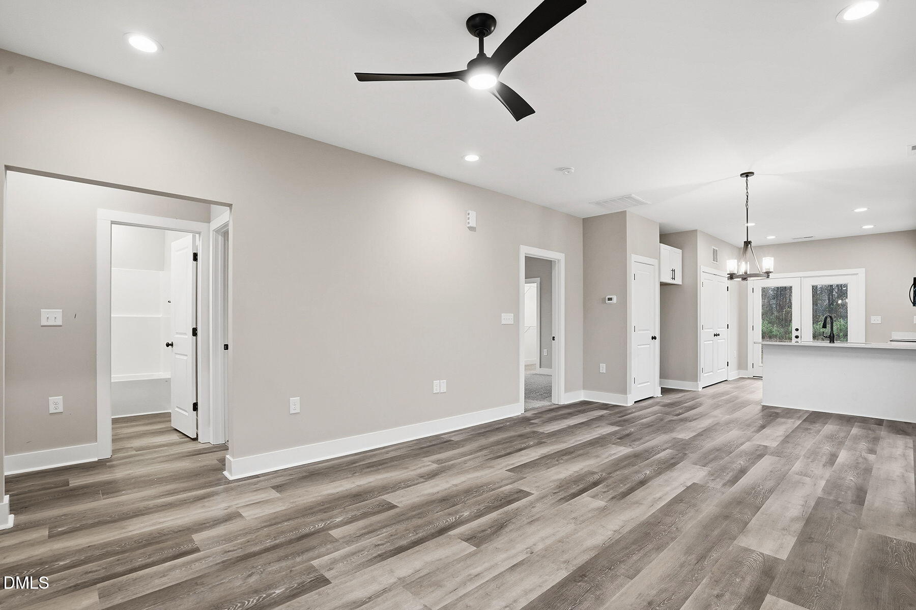 1029 Jada Allen Road Dunn, NC 28334 - Photo 31 of 31 an empty room with wooden floor and windows