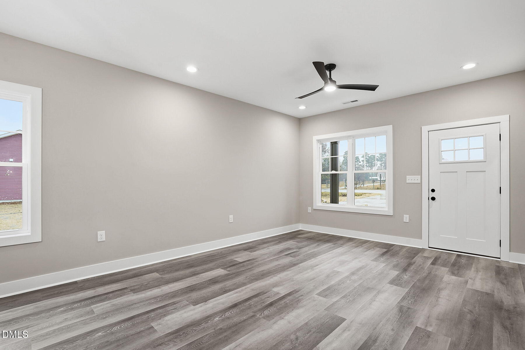 1029 Jada Allen Road Dunn, NC 28334 - Photo 6 of 31 wooden floor in an empty room with a window