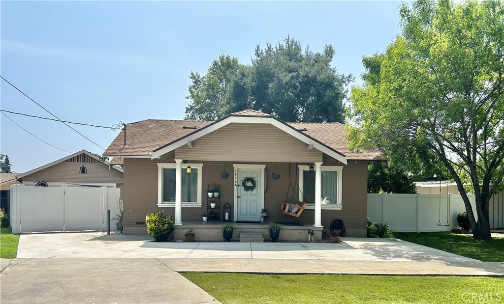 5668 Grand Avenue Riverside, CA 92504 - Photo 1 of 1 a view of a house with a swimming pool
