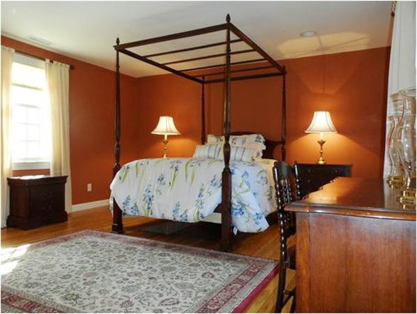 48 Jericho Road, Unit 48 Weston, MA 02493 - Photo 11 of 19 a bed room with a bed and a dresser