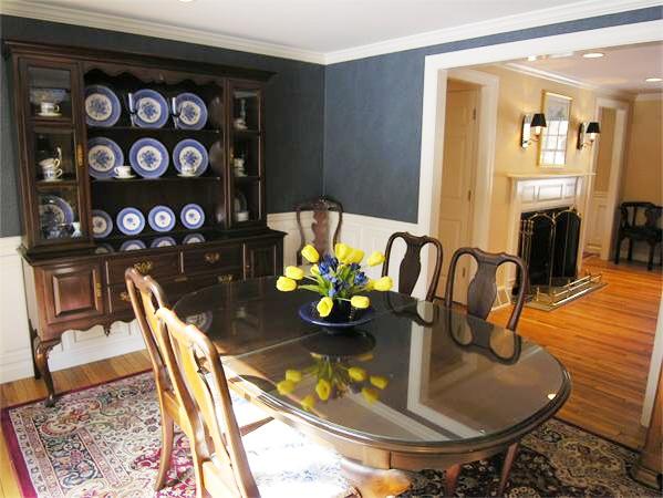 48 Jericho Road, Unit 48 Weston, MA 02493 - Photo 6 of 19 a dining room with furniture and wooden floor