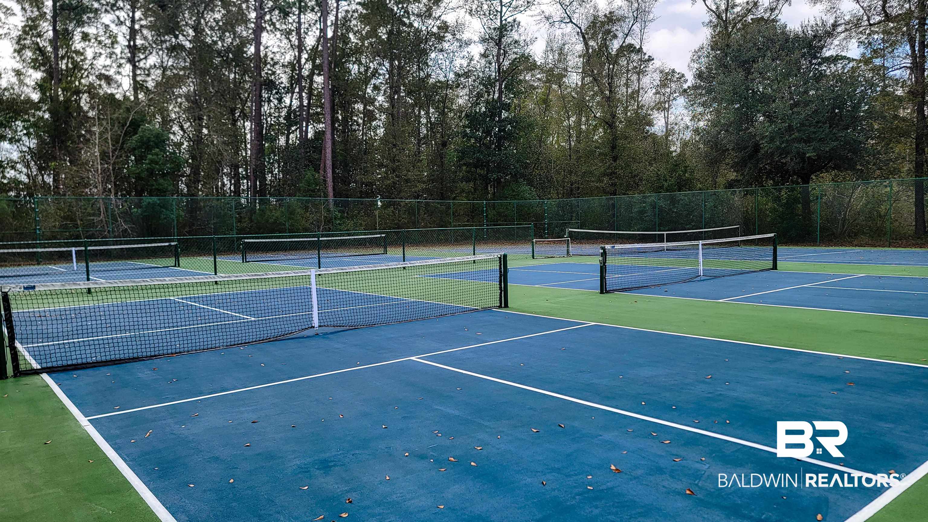 214 Hemingway Loop Foley, AL 36535 - Photo 50 of 67 View of tennis court with community basketball court