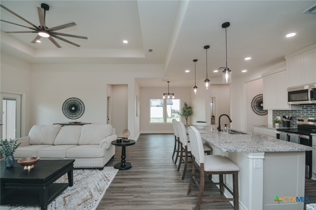 321 Whitetail Lane Victoria, TX 77905 - Photo 12 of 47 a large kitchen with a table and chairs