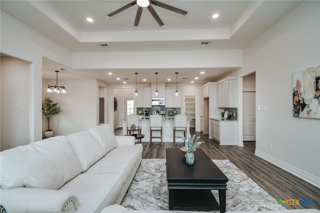 321 Whitetail Lane Victoria, TX 77905 - Photo 16 of 47 a living room with furniture and kitchen view