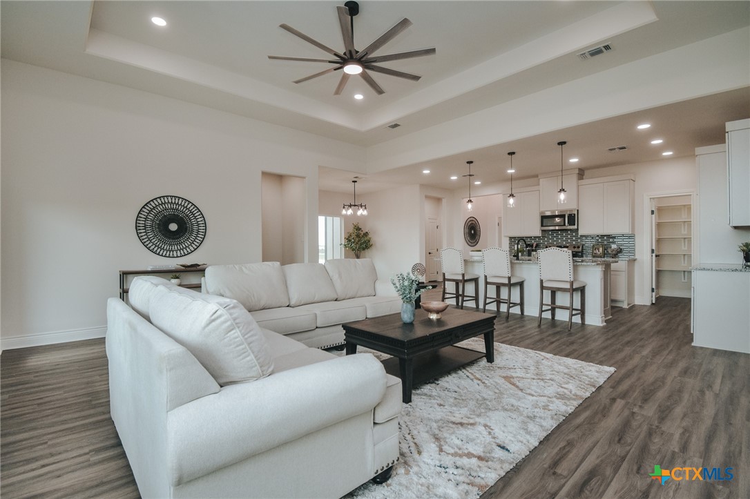 321 Whitetail Lane Victoria, TX 77905 - Photo 17 of 47 a living room with furniture and wooden floor
