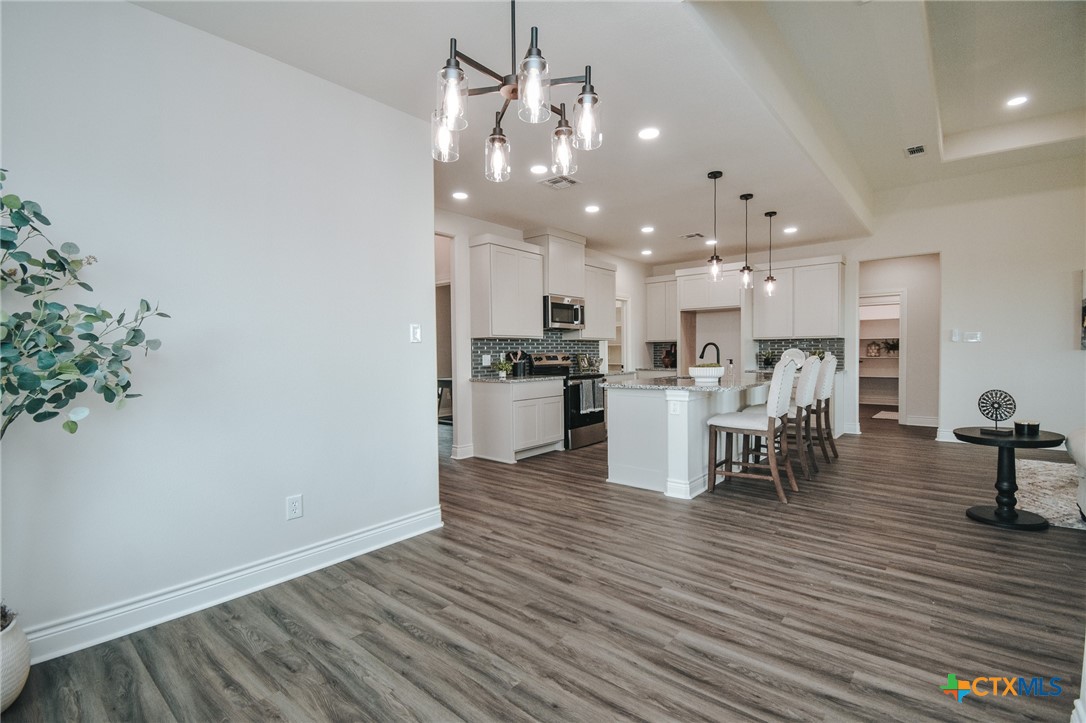321 Whitetail Lane Victoria, TX 77905 - Photo 20 of 47 a view of a kitchen with dining table and chairs